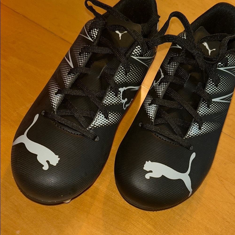 Puma boys Black and White Athletic Cleats